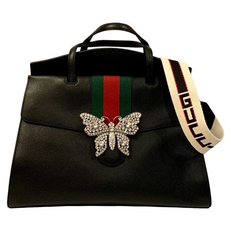 gucci t shirt butterfly|Gucci handbag with butterfly.